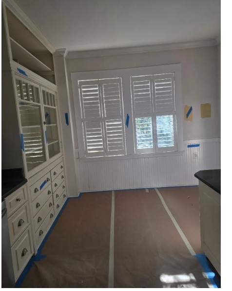 Finished interior with painted built-in cabinetry and shutters