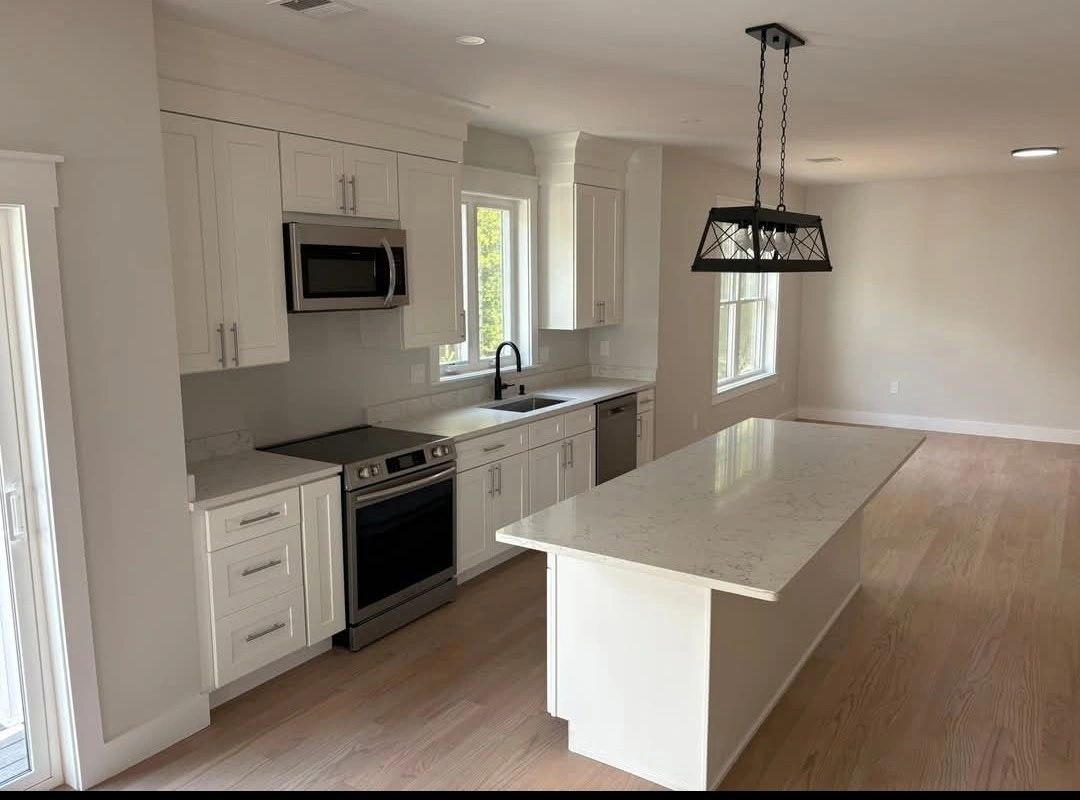 Freshly painted kitchen with white cabinetry